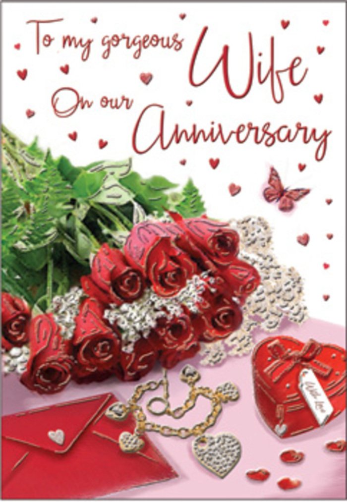 A richly layered anniversary tableau unfolds as though captured just after a thoughtful Golders Green florist finished their final touches, giving the scene an air of quiet celebration and cherished ritual. At the centre stands a bouquet of classic red roses, each bloom luxuriously full and perfectly shaped, with petals that spiral outward in a deep, velvety crimson. Their colour is bold yet reassuring, a timeless symbol of love, intensified by the contrast of lush, verdant greens that weave between the blossoms. The bouquet is positioned alongside a beautifully scripted card, the flowing handwriting edged by delicate heart motifs and soft, romantic patterns. Nearby, scattered trinkets tell a story of years spent together: a matching jewellery set that glistens in the light, a vivid red box with a velvety finish suggesting a ring or precious keepsake tucked inside, and perhaps a fine chain that curves gracefully across the surface. Wisps of lace or fabric, light as air, add texture and a hint of vintage charm, catching the light much like the clouds drifting over Hampstead Garden Suburb. The palette of reds, creams, soft blushes, and glints of gold and silver wraps the whole composition in warmth, reminiscent of the cosy cafés and tree-lined streets around Golders Green. Every detail-from the sheen on each petal to the reflective facets of the jewellery-speaks of thoughtful design and tender care. This image not only celebrates an anniversary but evokes the feeling of being held close, of love that has deepened and mellowed over time, strengthened by shared moments and quiet, everyday acts of devotion.